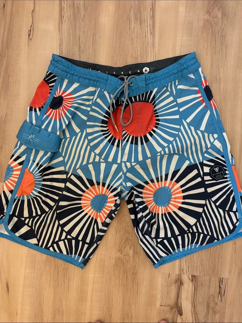 VISSLA Blue, Orange & White Radial Graphic Boardshorts